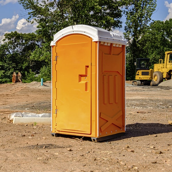 how often are the porta potties cleaned and serviced during a rental period in Marquette